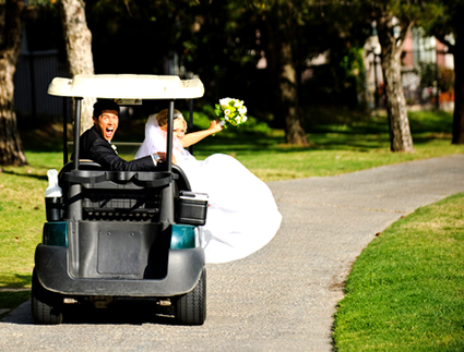Couple in golf cart after wedding