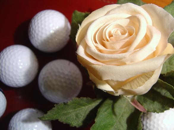 Golf balls with rose