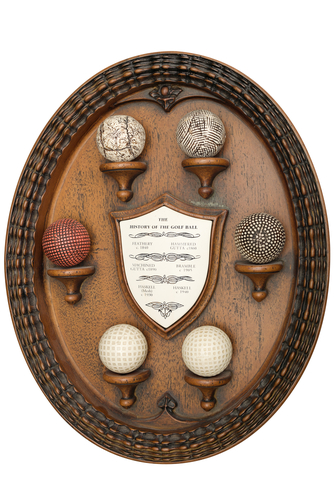 wooden-object-that-tells-the-story-of-golf-balls